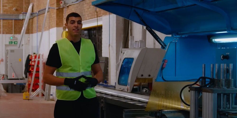 aluminium tubes on the bed of cutting machine