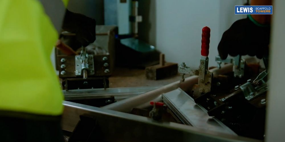 scaffold tower bandstand secured in the machine jig